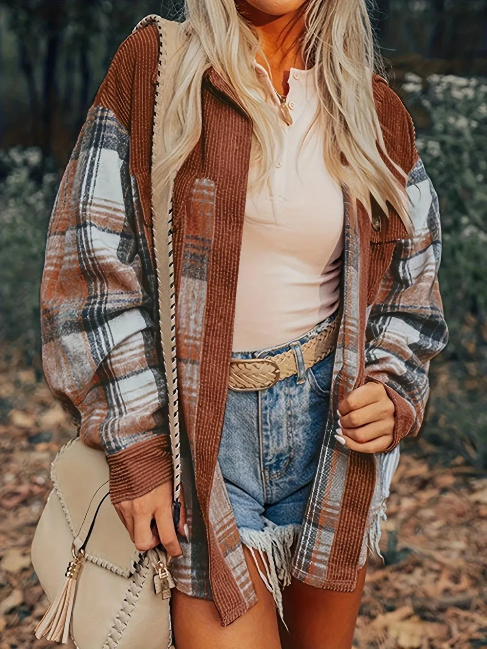 Plaid button-down shacket with corduroy trim styled with denim shorts