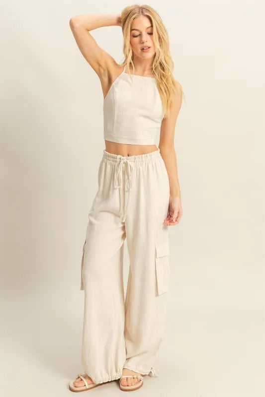 Full-length HYFVE two-piece outfit styled with heels for chic streetwear