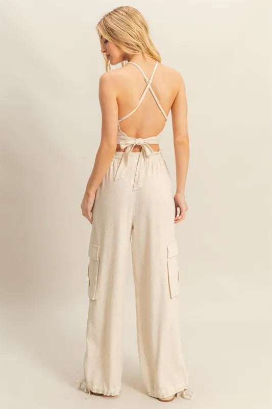 Back view of cream HYFVE two-piece crop top and cargo pant set