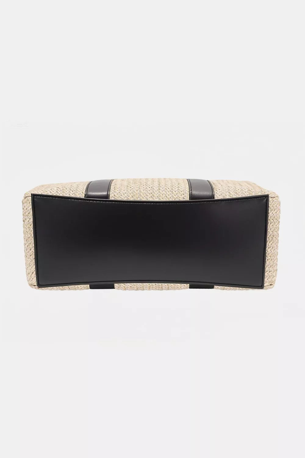 Bottom view of woven square handbag with structured design