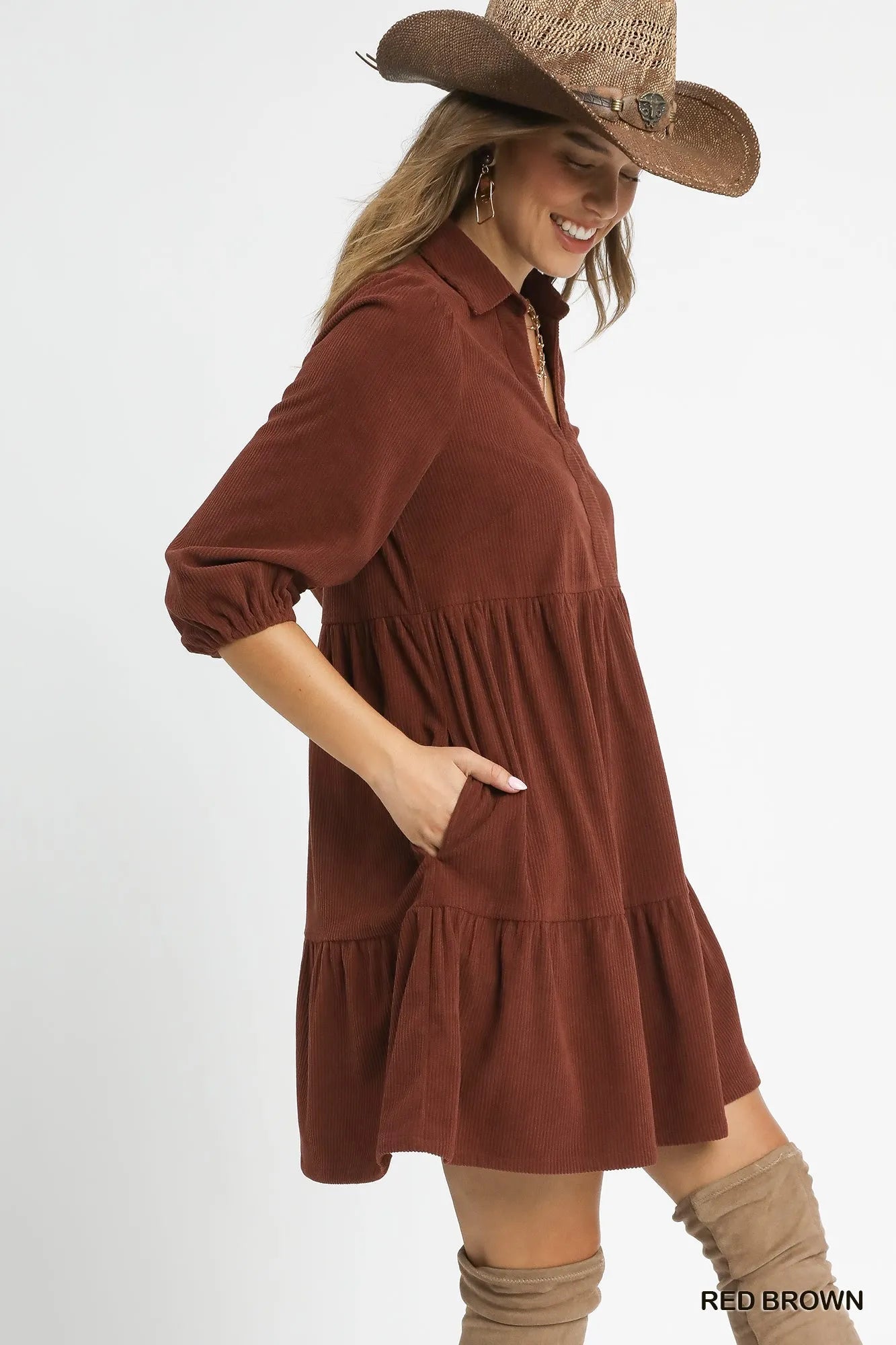 Side view of corduroy mini dress with above-knee length design