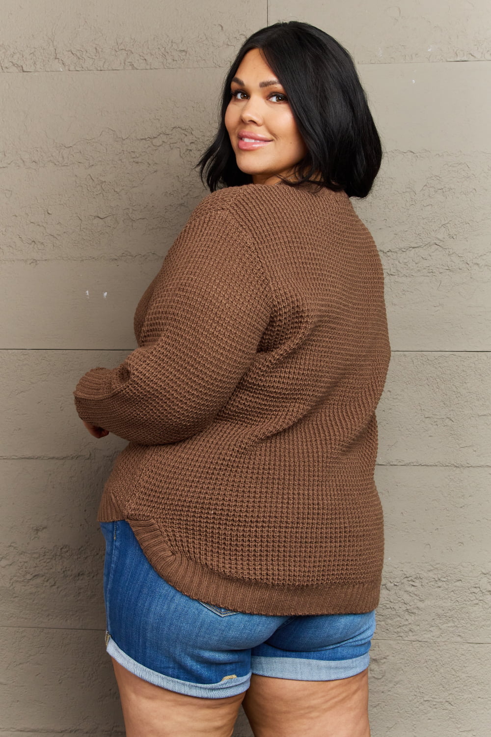 Back view of waffle knit sweater with ribbed cuffs and hem